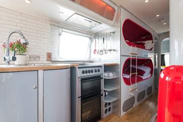 The kitchen includes an electric cooker - ideal for rustling up a scumptious supper.