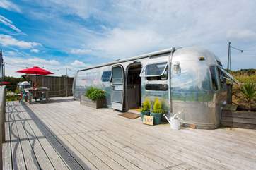 The decks wraps around Finley, perfect for sitting in the sun.