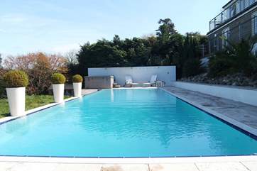 The heated 15 metre pool (available from the beginning of May to the end of September) with the hot tub at the far end.