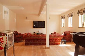 The big family-room has plenty to keep everyone entertained.