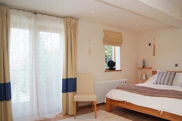 Bedroom 4 has doors out to the terrace.