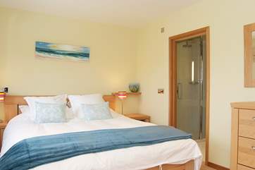 Bedroom 1 has an en suite bathroom with both bath and double shower cubicle.
