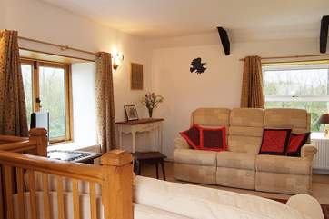 The upstairs sitting-room is comfortably furnished.