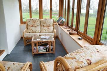 Room to relax, read or bird watch and a step up into the kitchen/diner.