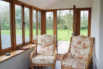 The front door opens into the conservatory.