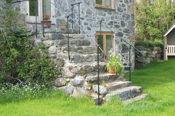 The steps from the garden up to the living-room and upstairs bedroom.