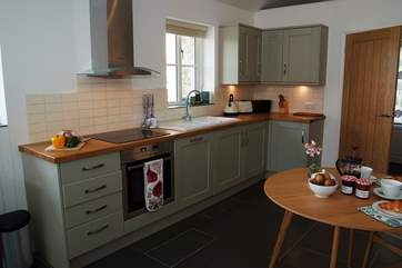 The well-equipped and very good looking kitchen.