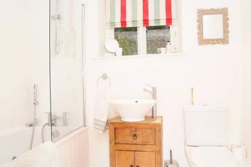 There is a bathroom with a spa bath as well as a separate shower-room.