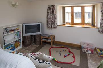 The second sitting-room is set up as a playroom for young children.