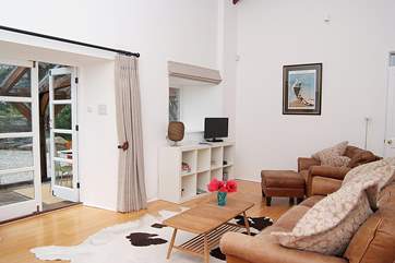 The gorgeous sitting-room with doors out to the conservatory.