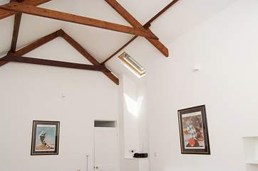The high-beamed ceiling in the sitting-room.