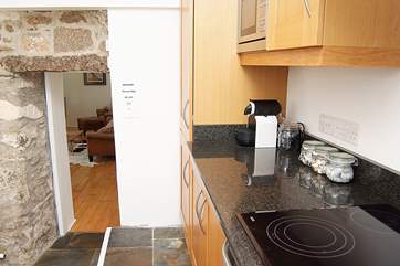 Looking from the kitchen down into the sitting-room.