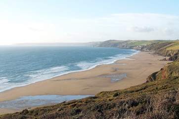 A footpath wends its way down the cliff to wonderful Long Sands below Tregantle Fort.