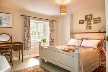 Bedroom 1 has a 5' double bed and a wash-basin.