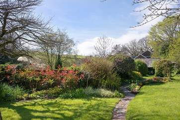 The pretty gardens with far reaching views of open countryside.