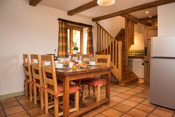 The main staircase leads off from the kitchen/diner.