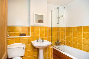 The bathroom is bright and fresh.