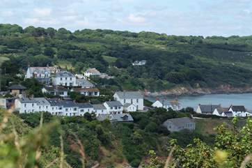 Mears Cottage is located just off the South West Coast Path and can be seen on the far left of the photograph.