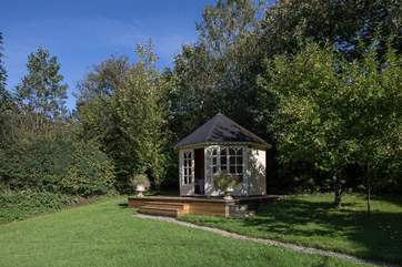 The path takes you through to this charming spot where this beautiful summer-house awaits.