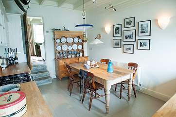 The spacious kitchen and dining-area, perfect for a family gathering.