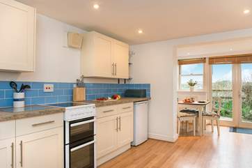 The open plan kitchen dining area is ideal for all the family