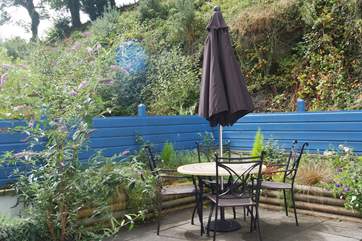 The sheltered courtyard beside the cottage- a lovely spot to sit out and enjoy morning coffee or supper on a balmy summer's evening