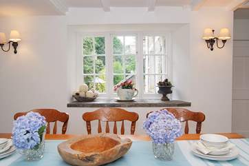 The dining-area looks out over the rear courtyard.