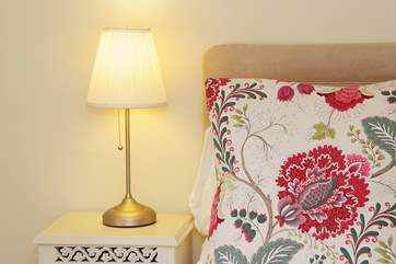 Pretty cushions and lamps in Bedroom 4.