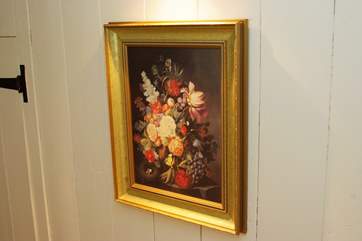 Artwork adorns the walls in the house.