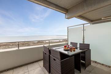 The balcony runs the full width of the apartment and has fabulous open sea views.