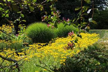 The garden flowers are beautiful throughout the spring and summer.