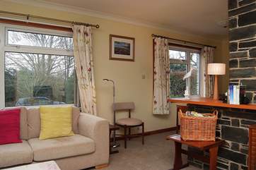 The sitting-room leads to the dining-area.