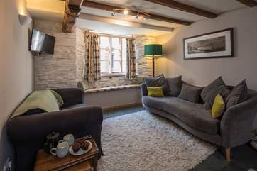 The living-room offers a cosy area to cuddle up after an action-packed day.