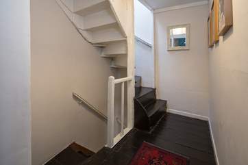 The stairs are quite steep; however hand rails are provided to help. These steps lead from the first-floor landing to the second floor bedroom.