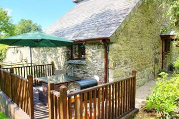 The sunny deck outside the cottage
- perfect for dining al fresco or to chill out and relax with a good book.