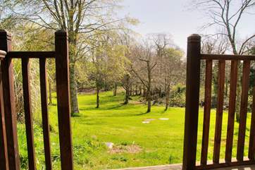 Looking down at the paddock from the outside decking.