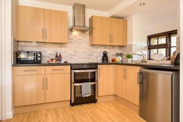 The kitchen is well-equipped.