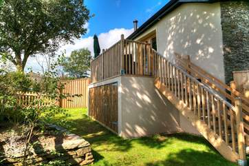 The raised deck and small garden below.