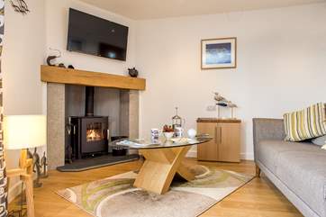 The toasty wood-burner makes this an ideal retreat all year round.