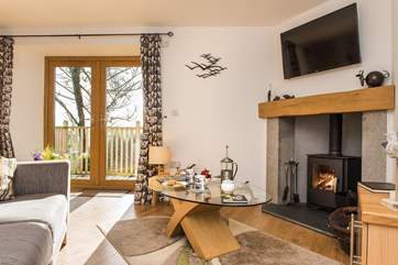 The patio doors lead out to the deck-area.