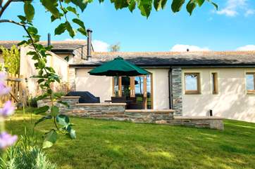 The sunny patio and garden at Tregantle.