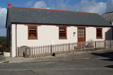 The cottage sits on the far side of the courtyard with the Owners' farmhouse and the other holiday cottages on either side.