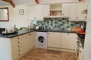 The kitchen is very well-equipped with everything you could need.