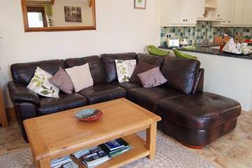 A comfy sofa to relax with a book, watch TV or simpy take in the view.
