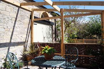 Enjoy a morning coffee or evening glass of wine outside the cottage.