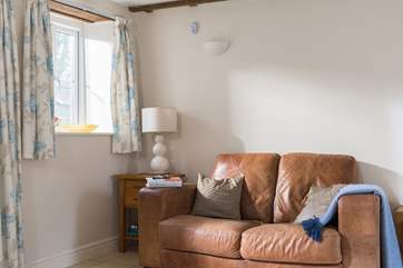 A comfy leather sofa to relax in.