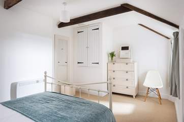 There is plenty of storage in the attractive built in cupboard and drawer unit. (This bed has been replaced with a king-size double bed - photographs to follow.)