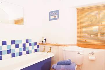 There is a family bathroom on the first floor, with a roll-top bath.