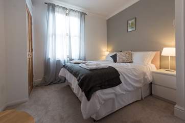 The ground floor rear bedroom.