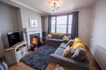 The sitting-area has lovely sea views across Newlyn Harbour.